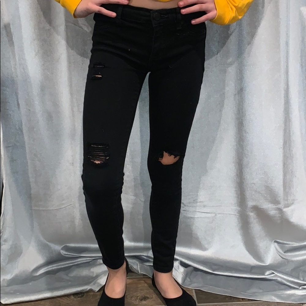 black ripped jeans from Tillys
